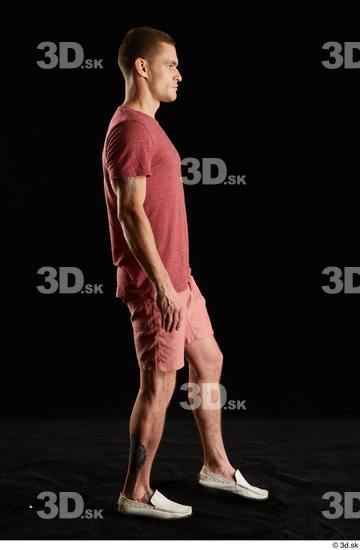 Max Dior  dressed red shorts red t shirt side view walking white loafers whole body  jpg