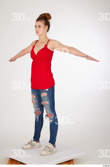 Olivia Sparkle blue jeans with holes casual dressed standing t poses white sneakers whole body  jpg